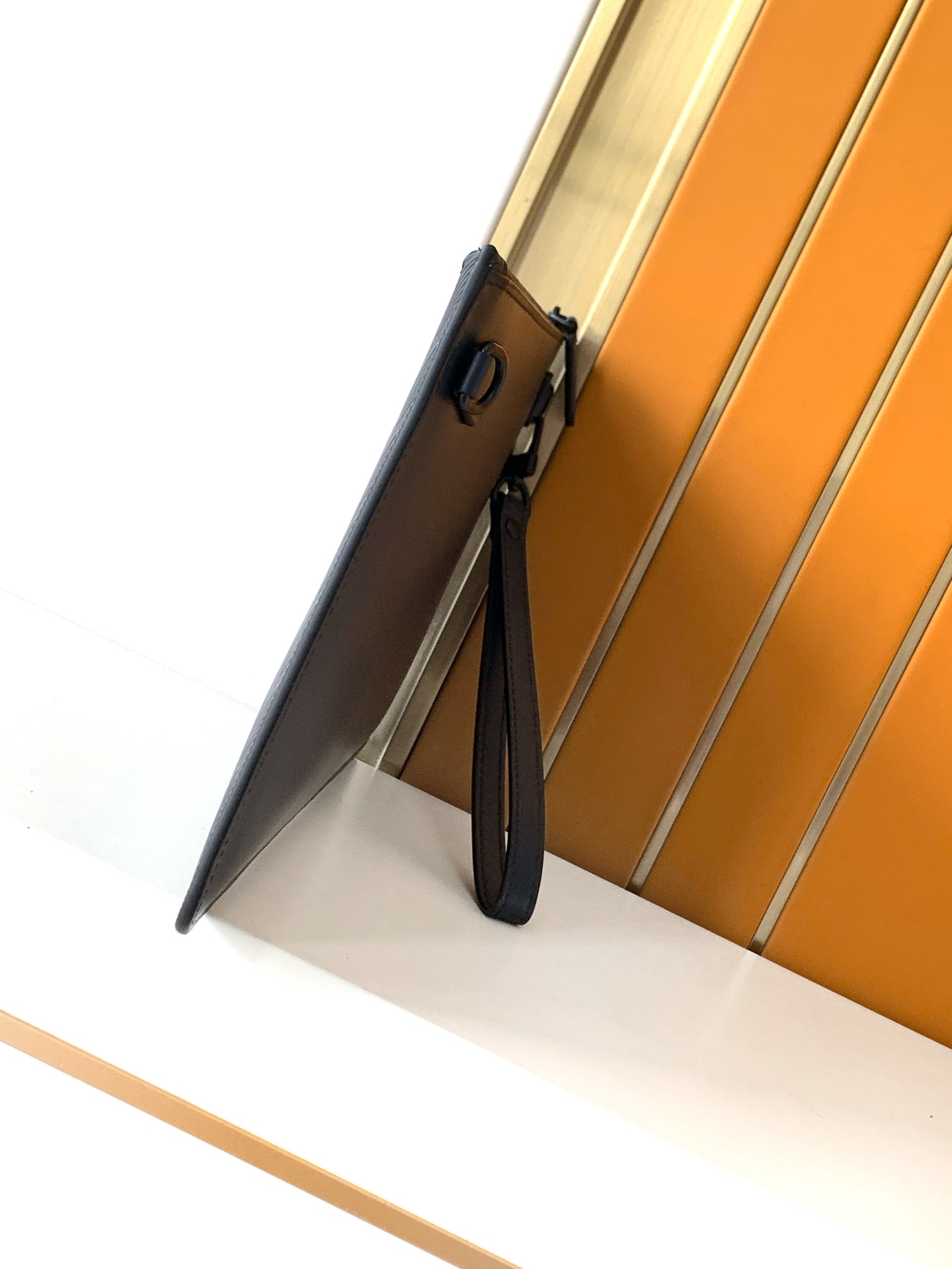 Heren lederen clutch met relië - Card Top Loader recensie en prijs
